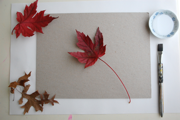 leaves and glue on paper